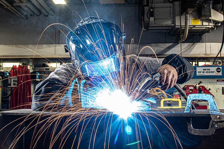 San Juan College student practicing welding